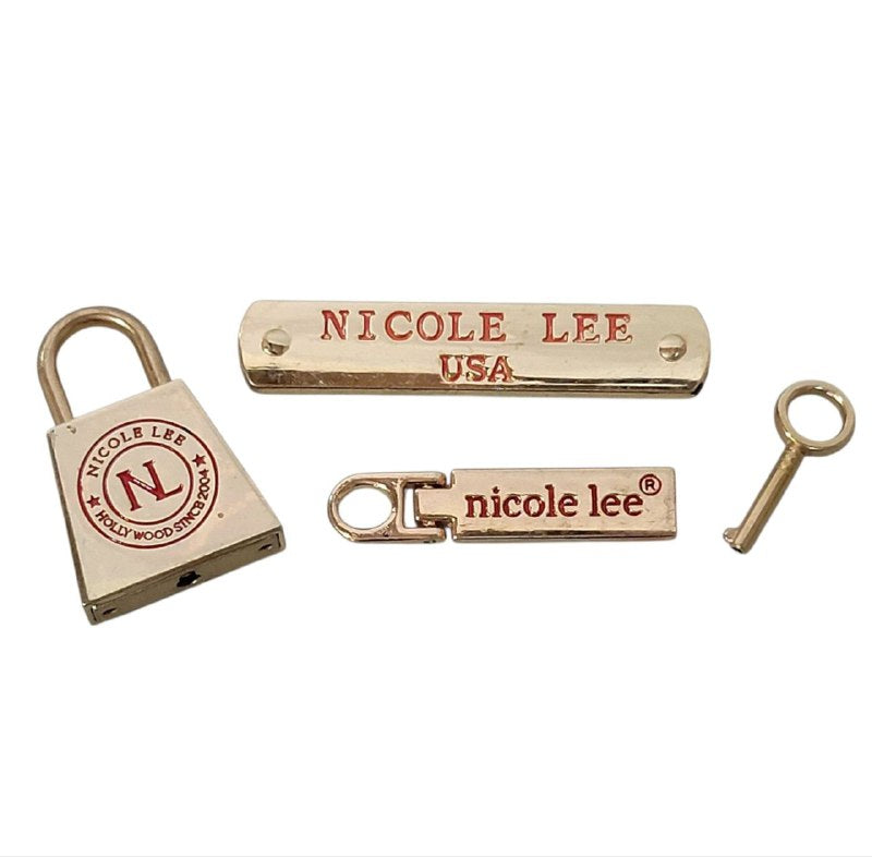 CHAPA PARA CARTERAS NICOLE LEE