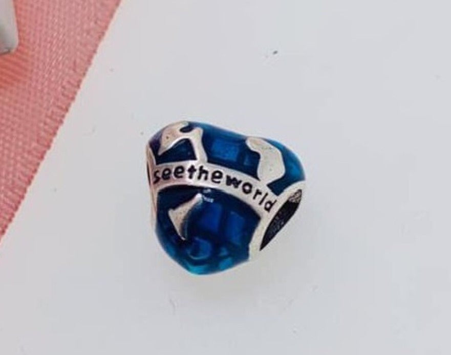 PCHARM1485 CORAZON AZUL CON MENZAJE (VER EL MUNDO)