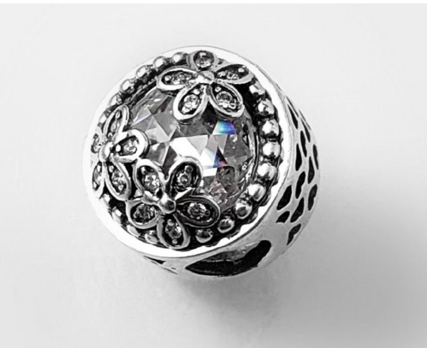 PCHARM2113 CIRCULAR CON CIRCON TRANSPARENTE Y FLORES