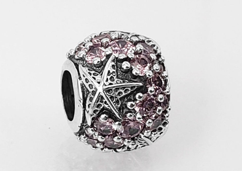 PCHARM2155 SEPARADOR CON CIRCONES ROZADOS Y ESTRELLA DE MAR