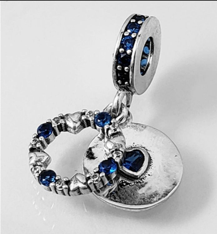 PCHARM2285 COLGANTE DOBLE CON CIRCONES AZULES Y TRANSPARENTES