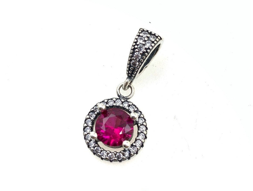 PCHARM2549#1 COLGANTE CIRCULAR CON CIRCON FUCSIA EN MEDIO