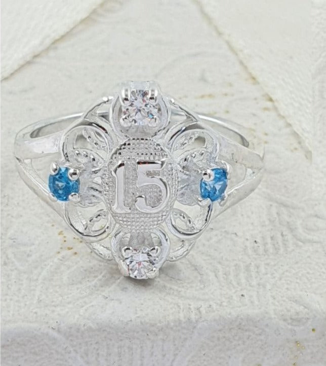 PANI1702A ANILLO 15 AÑOS OVALADO PIEDRAS AZULES, PLATA 925