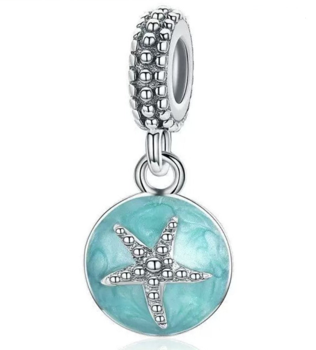 PCHARM2768 COLGANTE CIRCULAR CON UNA ESTRELLA DE MAR EN MEDIO