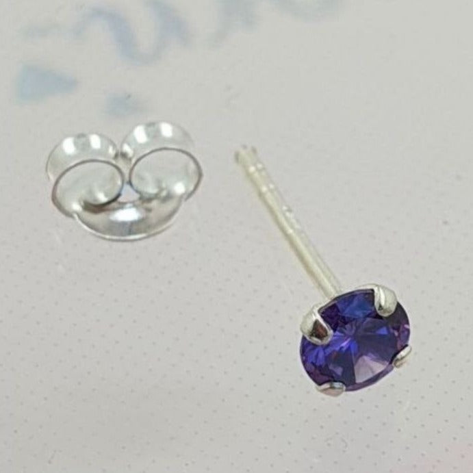 PIERCING DE PLATA 9.25 CON PIEDRA MORADA CIRCULAR