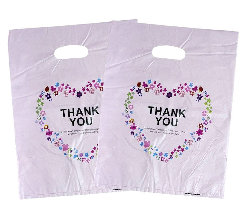 BOLSA DE REGALO PLASTICA GRANDE 30X40CM, PAQUETE 100UND