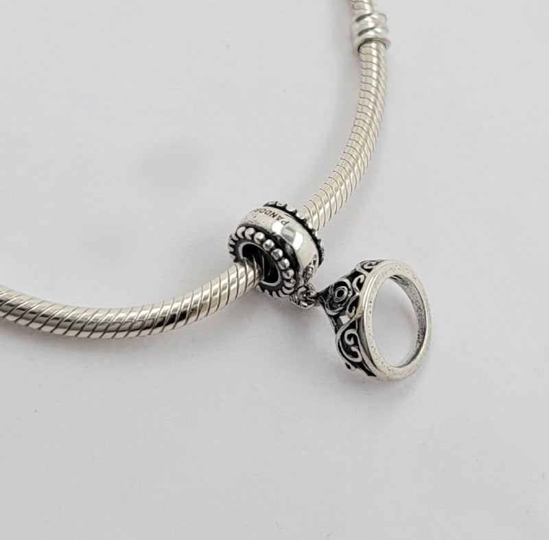 PCHARM1518$1 FORMA CORONA PANDORA PLATA 9.25