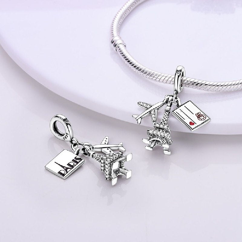 PCHARM4059 AVION,TORRE EIFFEL,POSTAL PANDORA PLATA 9.25