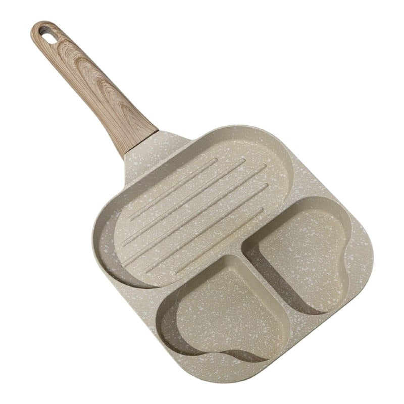 SARTEN MULTIFUNCIONAL CON MANGO DE MADERA, DISEÑADO PARA PREPARAR EL DESAYUNO PERFECTO RAPIDAMENTE, SU DISEÑO DIVIDIDO PERMITE COCINAR DIFERENTE ALIMENTOS AL MISMO TIEMPO SIN MEZCLAR SABORES SINMORE