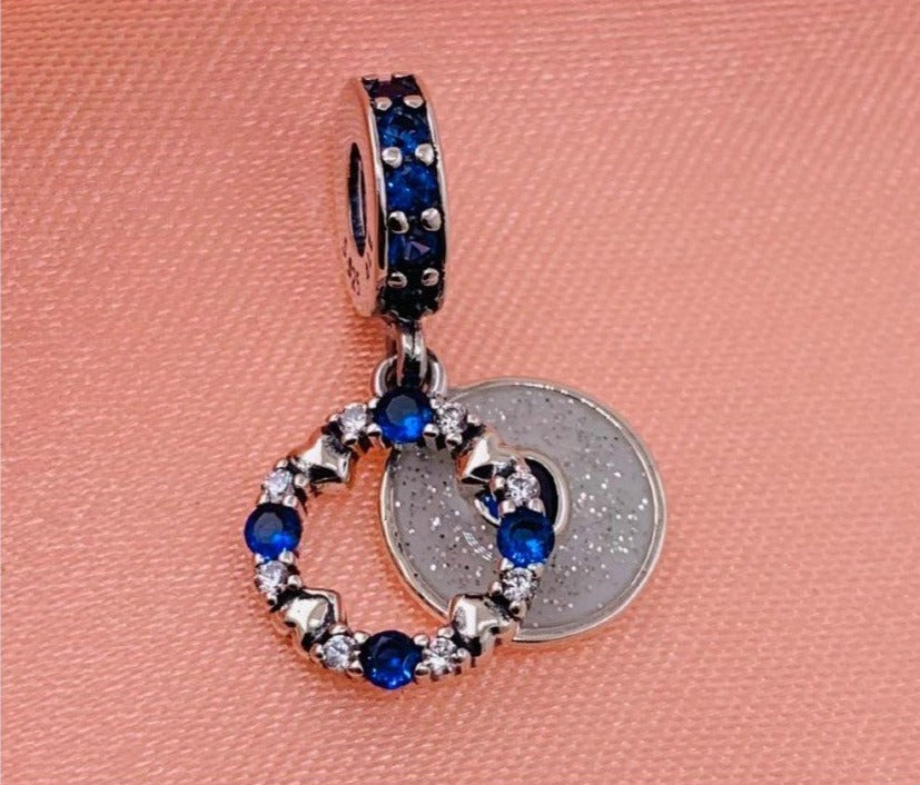 PCHARM2393 COLGANTE DOBLE CON CIRCONES AZULES Y TRANSPARENTES