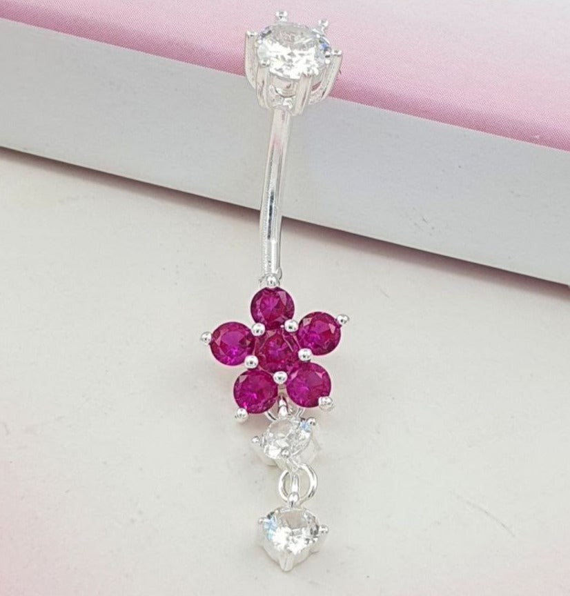 PIERCING DE PLATA 9.25 PARA OMBLIGO EN FORMA DE FLOR FUCSIA